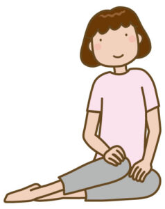 横座りしているイラストです。産後の股関節痛・膝関節痛・ぎっくり腰などの原因であると考えられます。